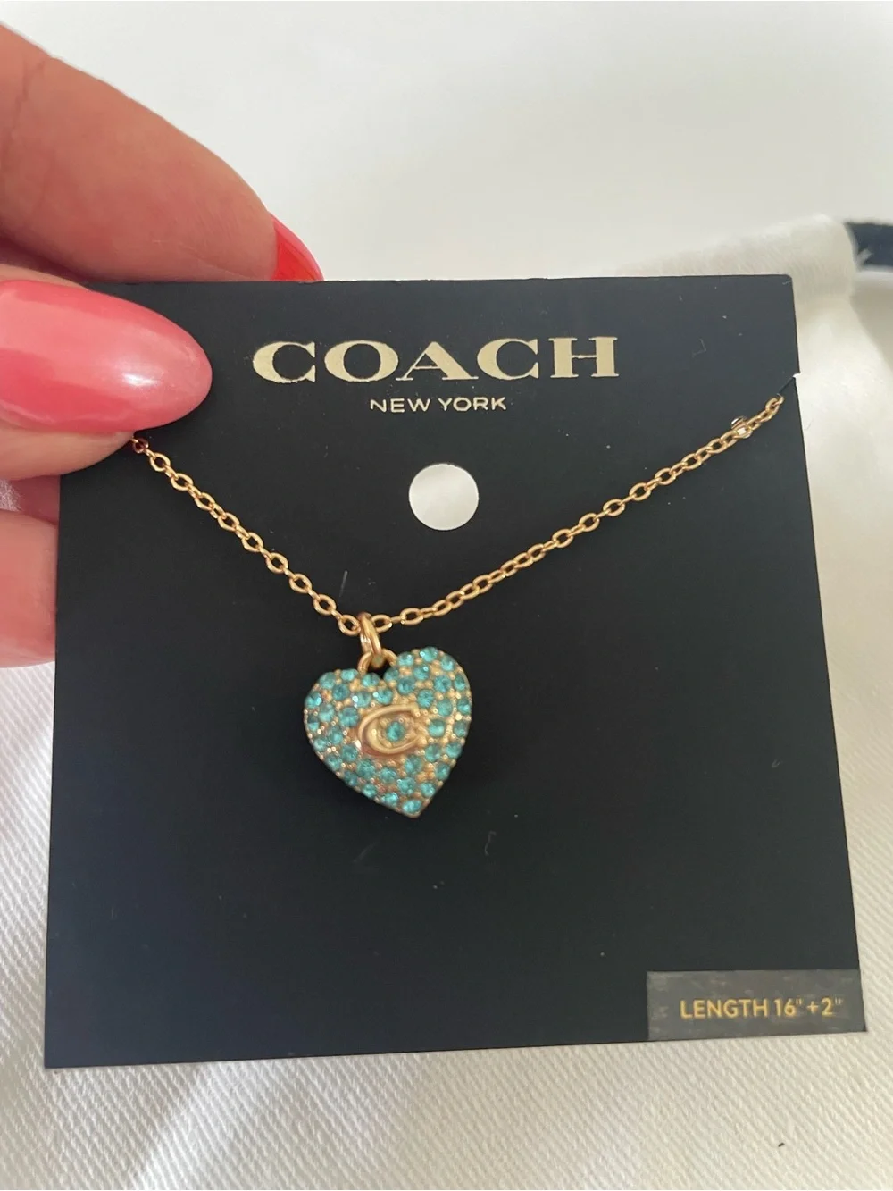 Coach Gold-Tone Heart Pendant Necklace with blue Crystals